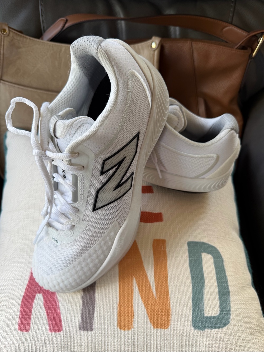 New Balance Women’s White Athletic Sneakers with Black Logo Accent